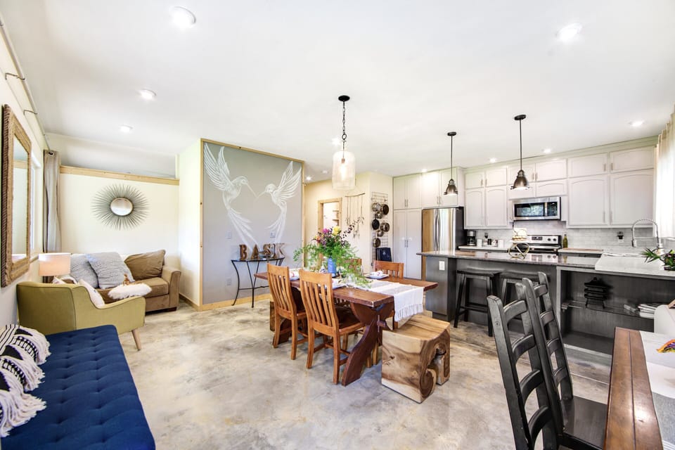 Step into the open concept great room complete with cooking, eating & gathering.