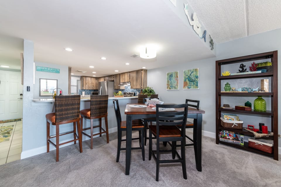An open kitchen so you don’t miss out on any of the fun! 4 bar chairs provided. 