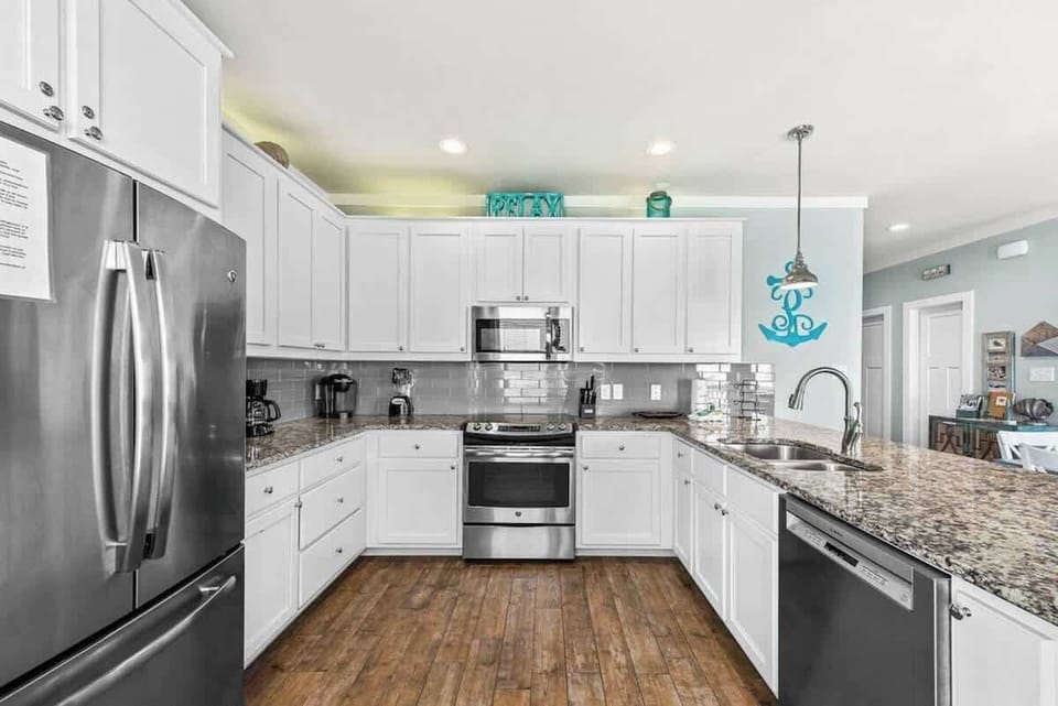 Coastal-inspired kitchen with spacious countertops and everything you need for your stay.