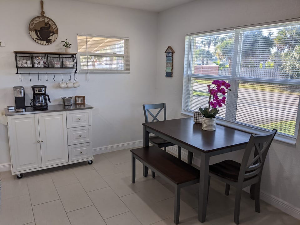 Dining table with seating for up to four.