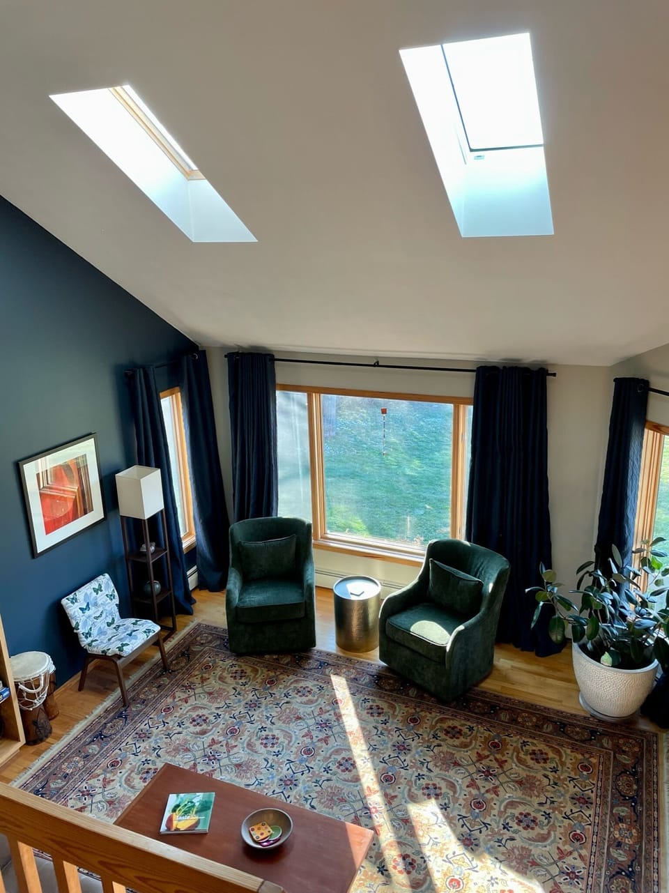 Living room, sunny, south-facing, vaulted ceiling w/two skylights