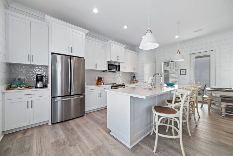 Kitchen has a coffee bar and all new stainless steel appliances. 