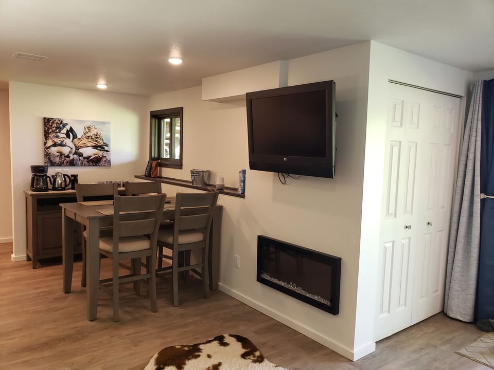 Fireplace and wall-mounted TV.  

