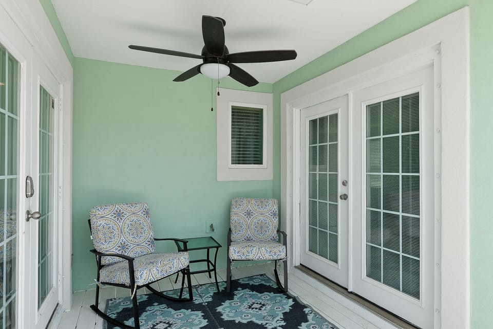Covered balcony perfect for morning coffee, or reading a book under the sun (off of the Oceanside Suite and kitchen table nook)