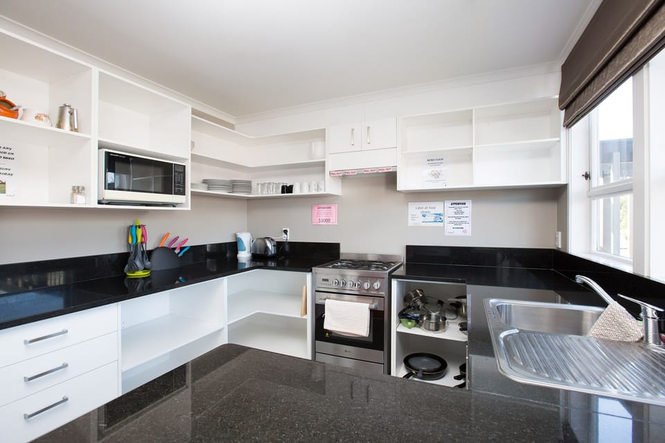 Shared fridge, microwave, cookware/dishes/utensils