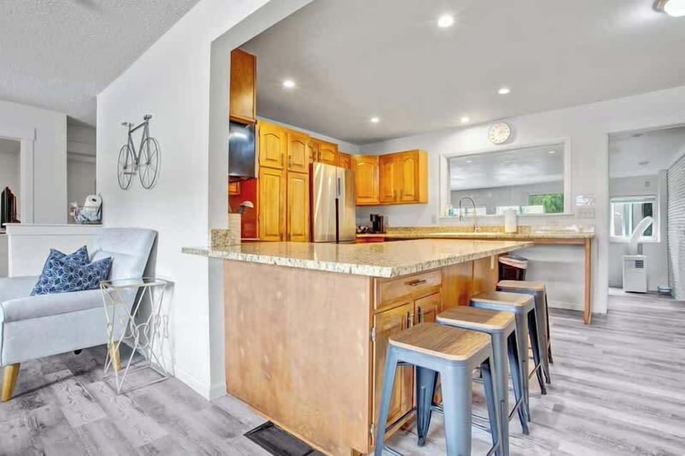 Fully stocked kitchen for you to prepare meals during your stay. Bar seating for 4!