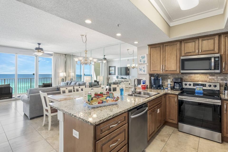 The dining table has room for the whole family! Enjoy a home cooked meal or some local take out while enjoying the sights and sounds of the Gulf.