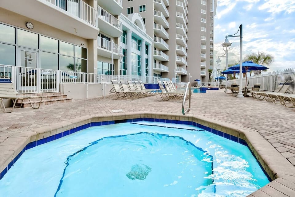 1 of 2 spacious hot tubs at Majestic Sun