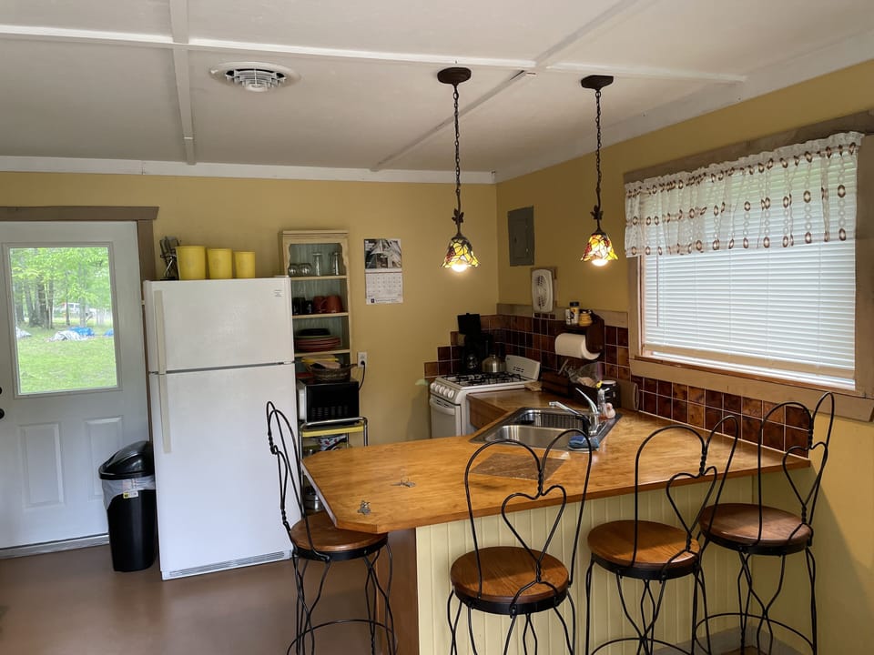 New gasrange 2021. Countertop refinished 2022. stocked w/pots, pans, utensils. 