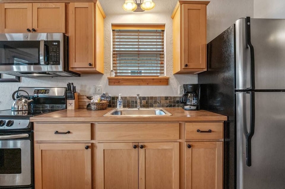 The kitchen comes with cooking essentials.