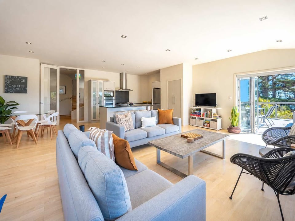 Open Plan Kitchen Dining and Living Area with Balcony Access and Ocean View