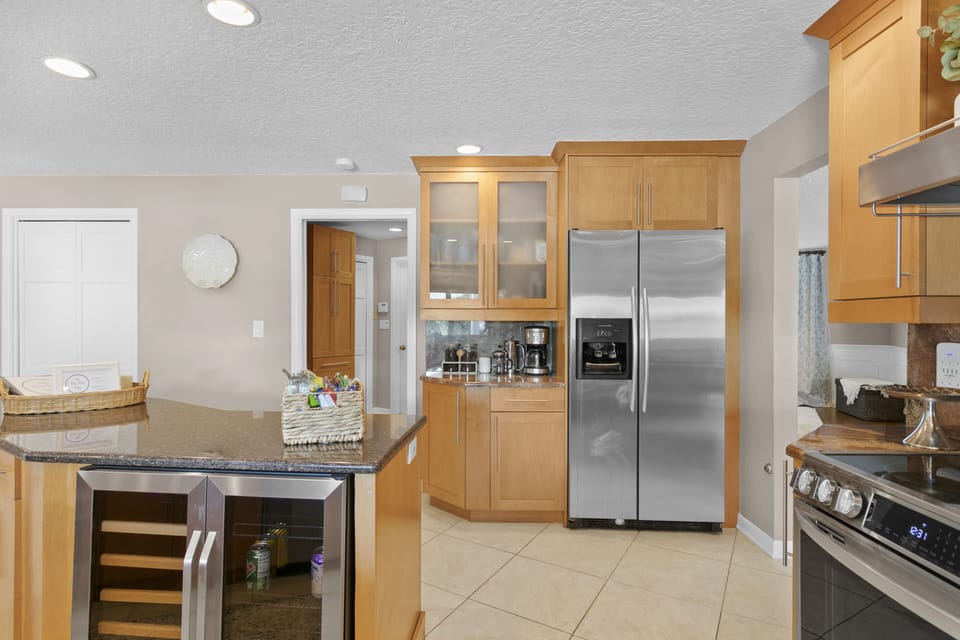 Modern kitchen with brand new stove and beer/ wine fridge!