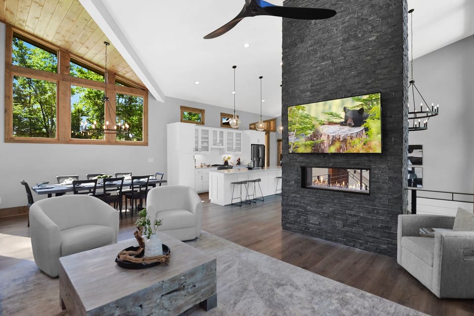Enjoy cozy fireside moments in the open area living room.