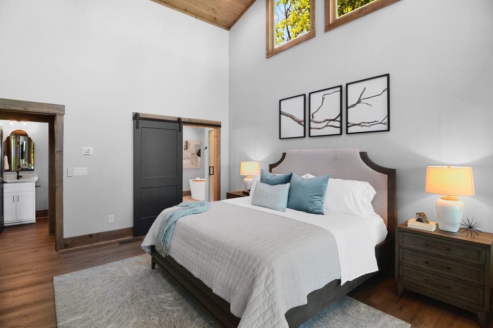 Vaulted ceilings and cozy comfort in the master bedroom.
