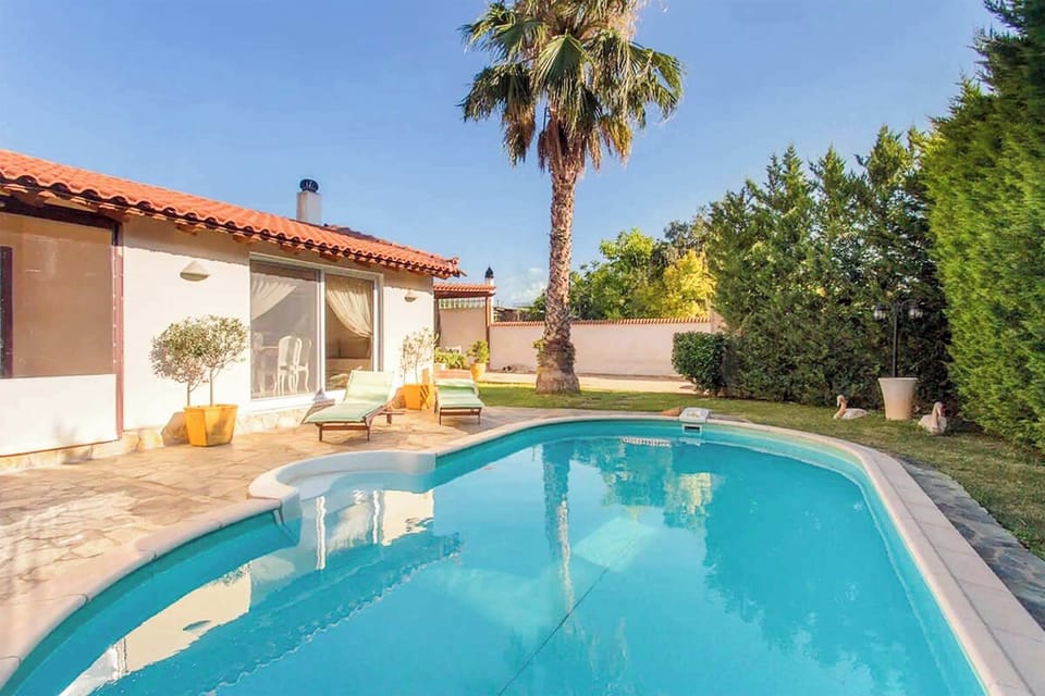 Azure waters meet endless blue skies

