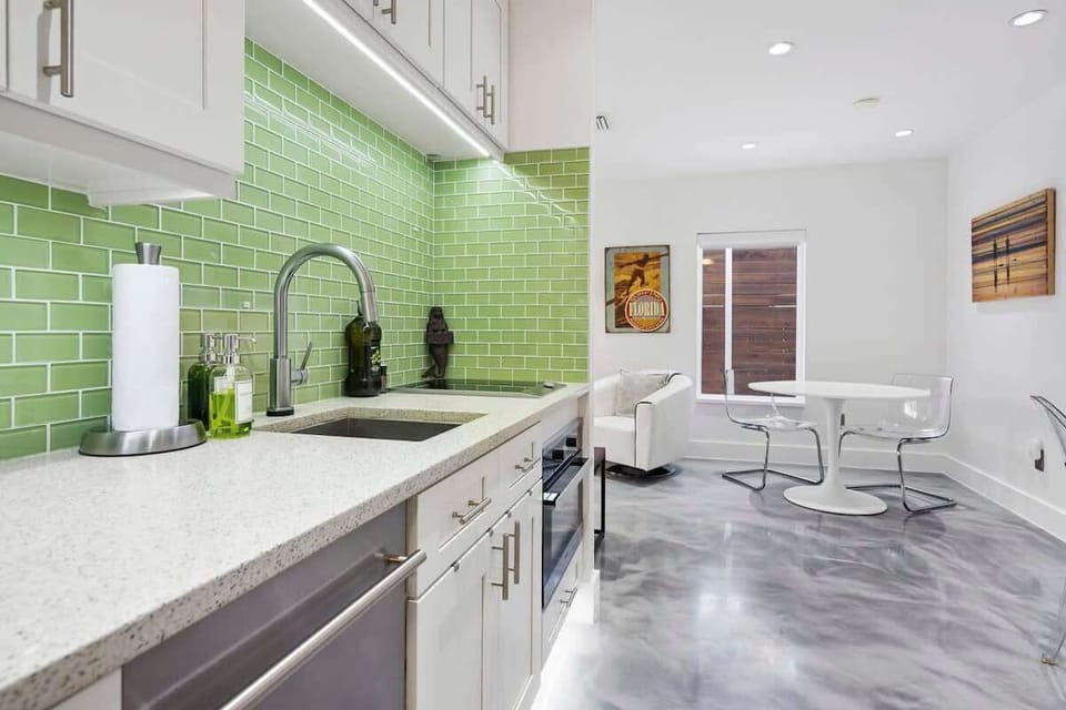 1st floor apartment with kitchen, living room, queen bedroom adjoining bathroom with walk in shower and washer/dryer.