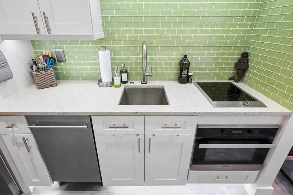1st floor apartment with kitchen, living room, queen bedroom adjoining bathroom with walk in shower and washer/dryer.