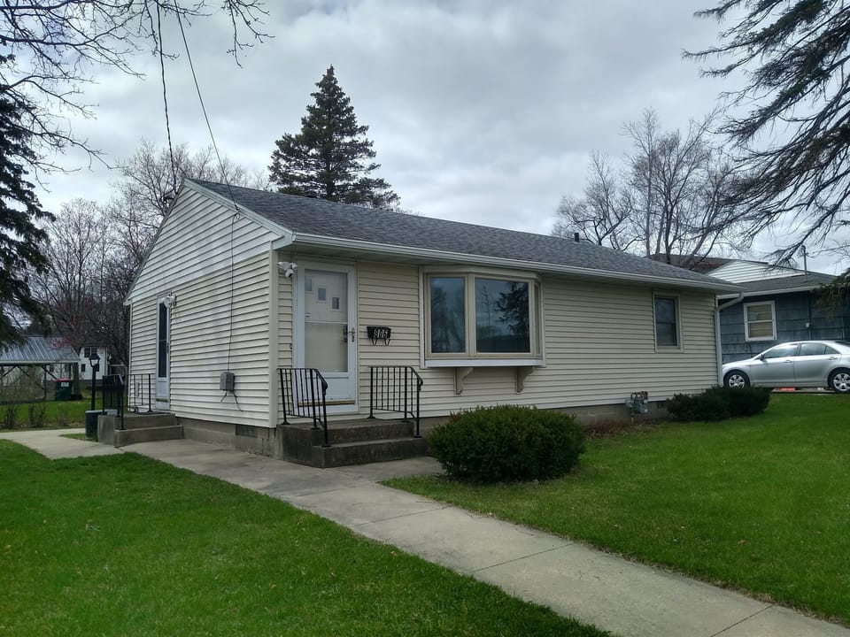 Outside view of ranch style home.  All 3 bedrooms on the main level and bathroom. 2nd bathroom downstairs.