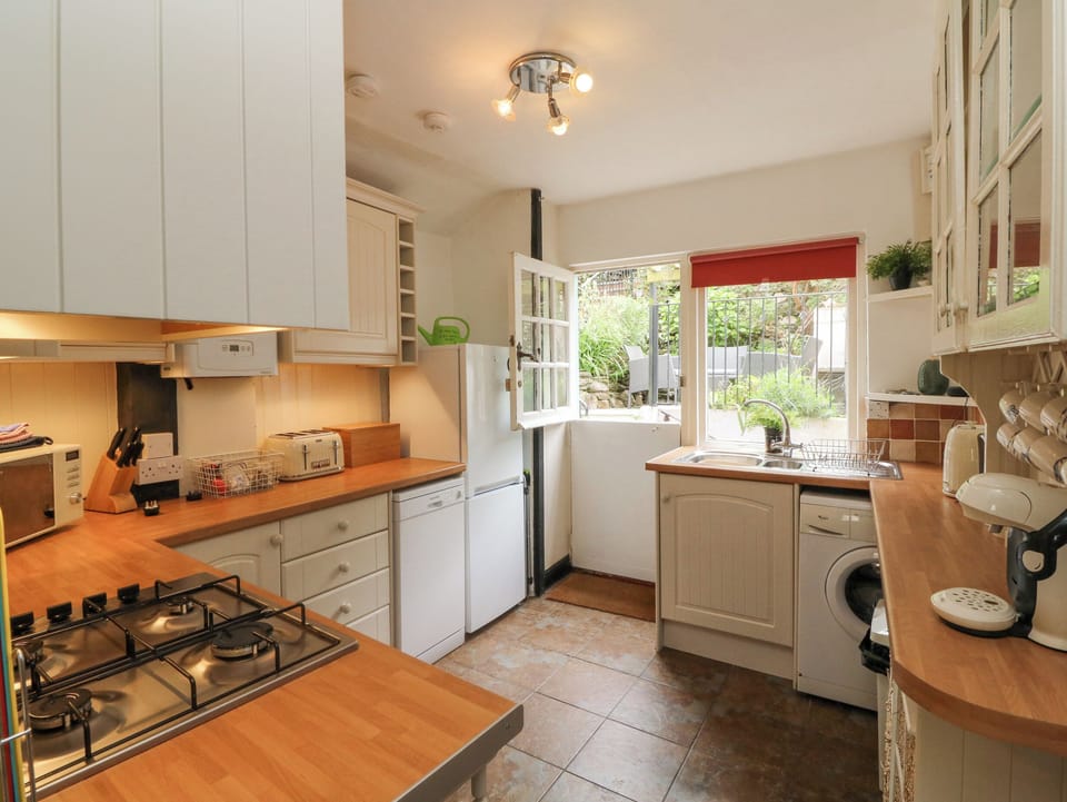 Fridge, dishwasher, electric kettle, cookware/dishes/utensils