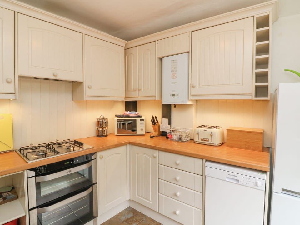 Fridge, dishwasher, electric kettle, cookware/dishes/utensils