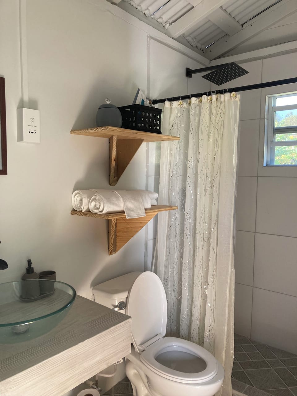 Bathroom has rain shower, hot &cold water, bath soap, shampoo & cond & towels