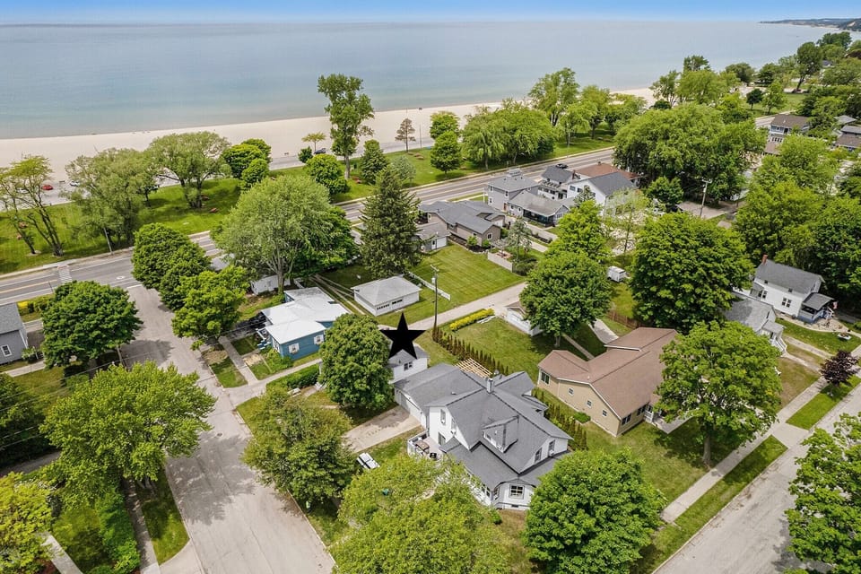 Less than a two minute walk from the driveway to the sand. 