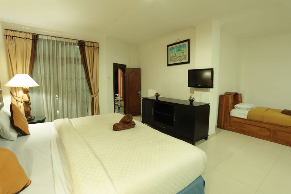 Minibar, in-room safe, desk, rollaway beds