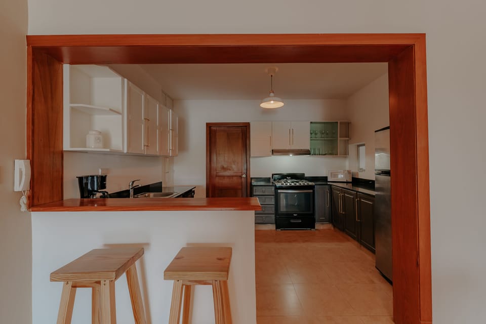 Apartment | Private kitchen | Full-size fridge, microwave, oven, coffee/tea maker