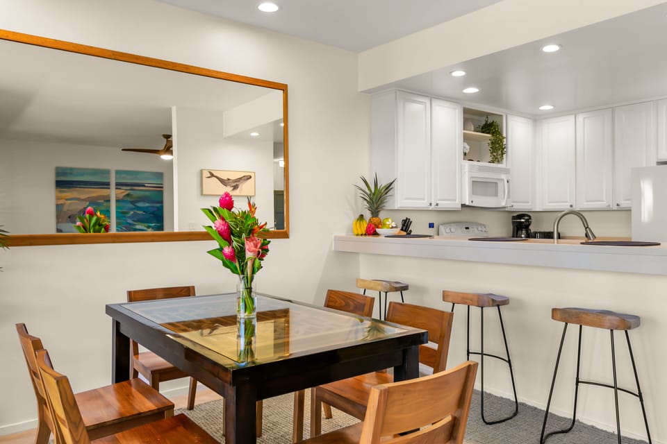 Dining room table seats 6 plus there are three bar stools at the kitchen counter