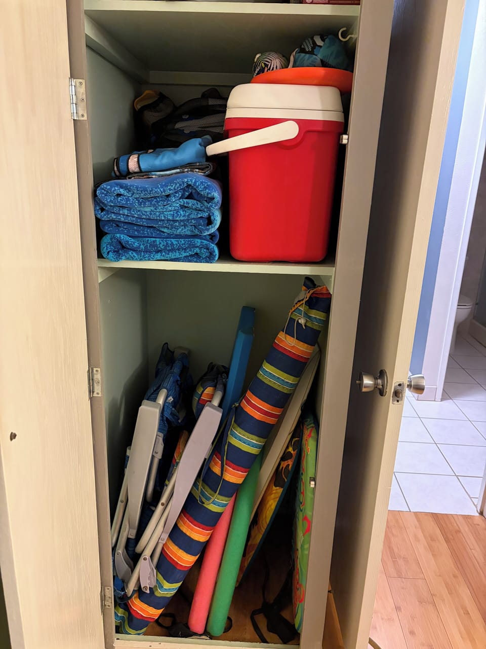 Beach Closet: 2 chairs, umbrella, snorkel gear, boogie boards, cooler, towels