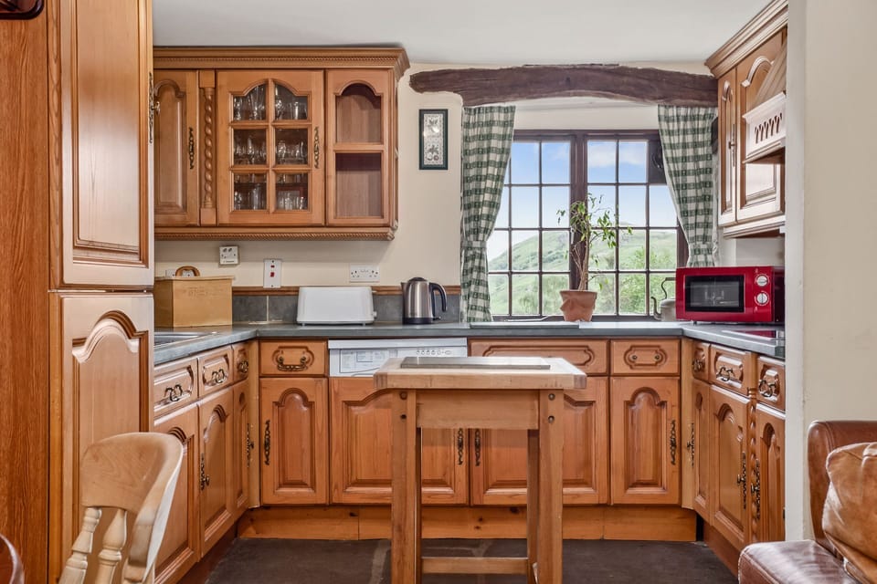 Carpenters Mountain Cottage in Coppermines Valley kitchen with Lake District views