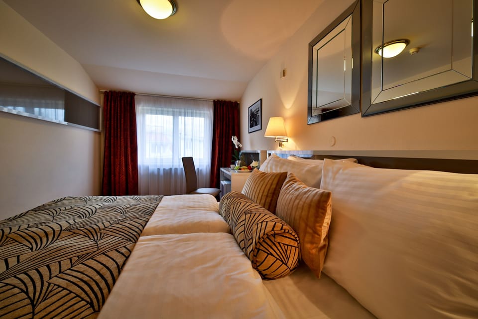Superior Double Room | Minibar, in-room safe, individually decorated, desk