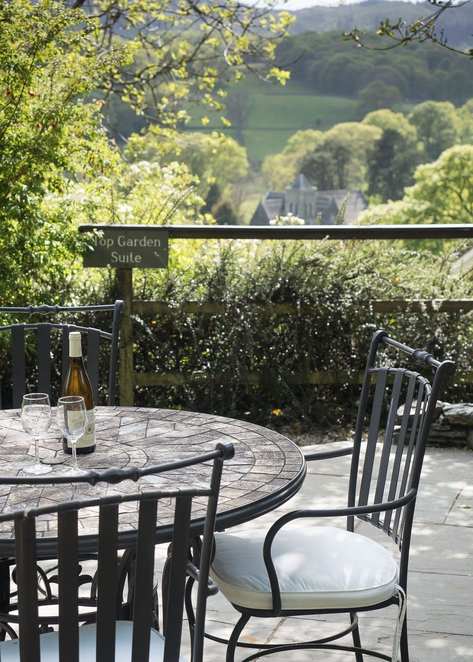 Patio with garden furniture at Top Garden Suite