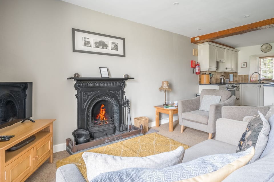 Sitting room in Tanderra with real open fire