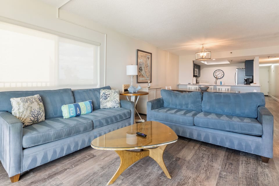 Living room with window overlooking second balcony to intercoastal views