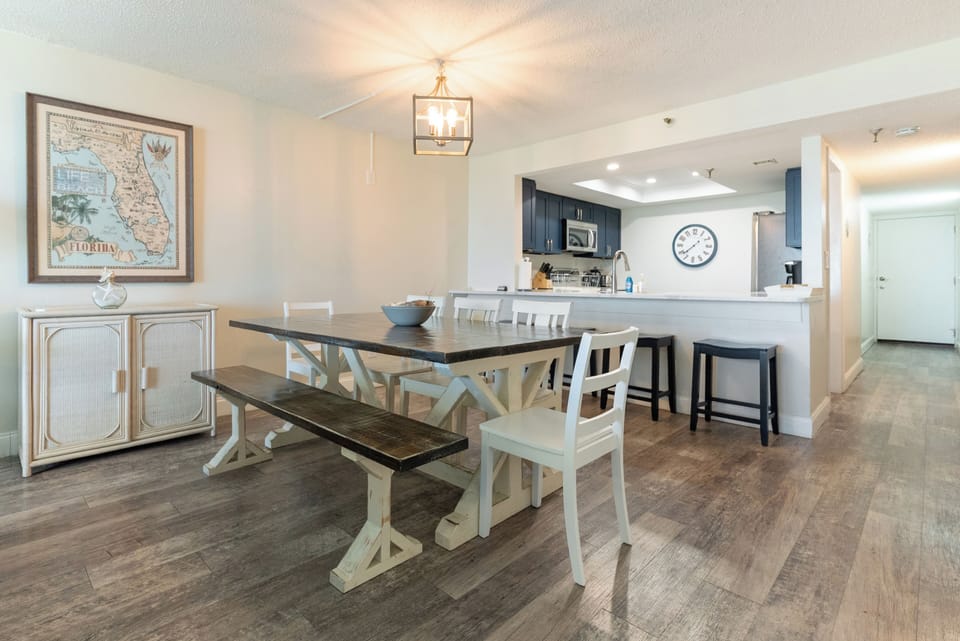 Dining room seating for eight overlooking kitchen