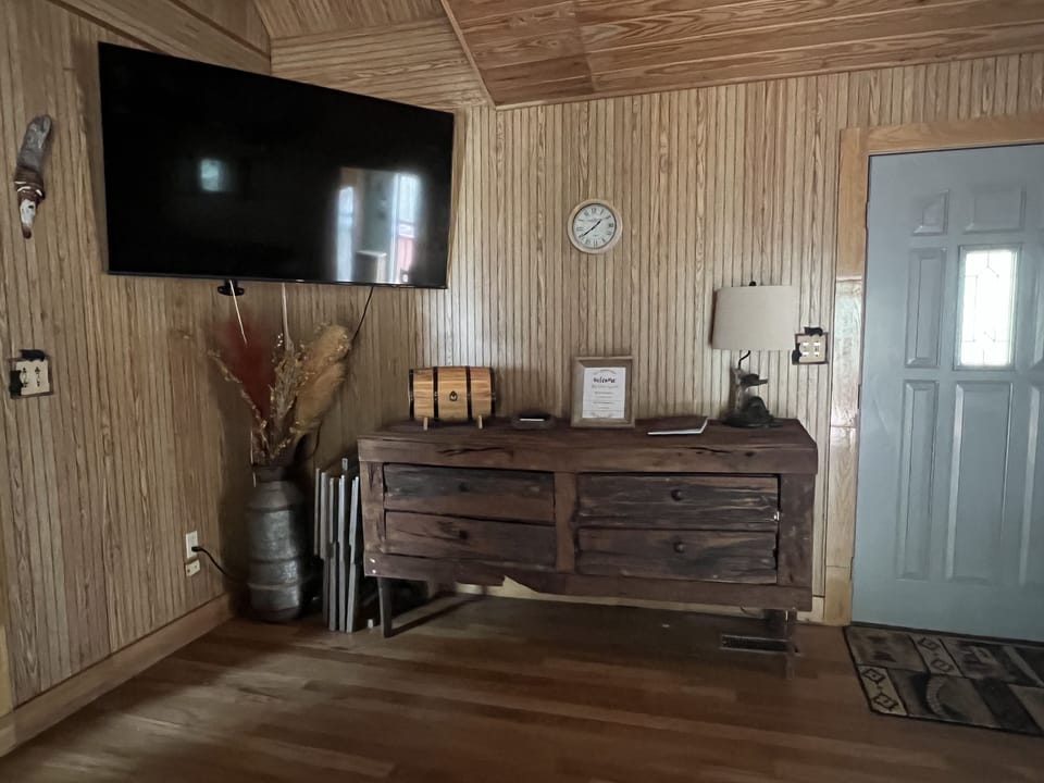 Living area with streaming 60” tv, games, and wi-fi.
