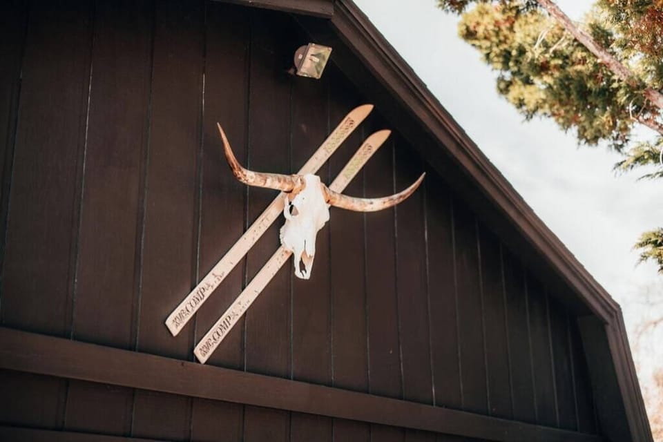 Bull skull and skis from before phones were invented and for times of relaxation that still exist in Big Bear. 