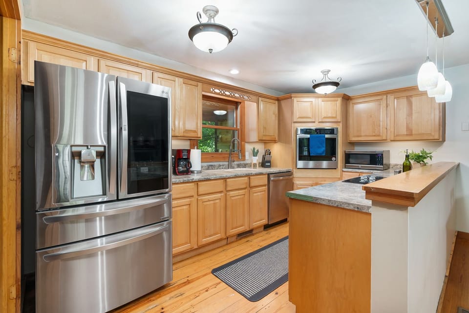 Full kitchen with high-end appliances.