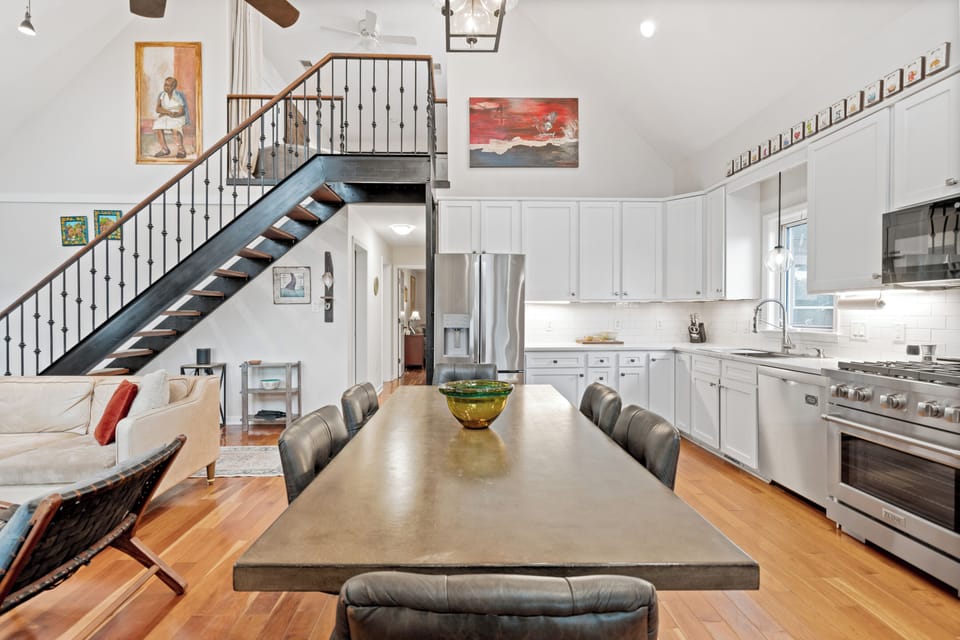 View of kitchen and hallway to master king bedroom, media room and queen bedroom