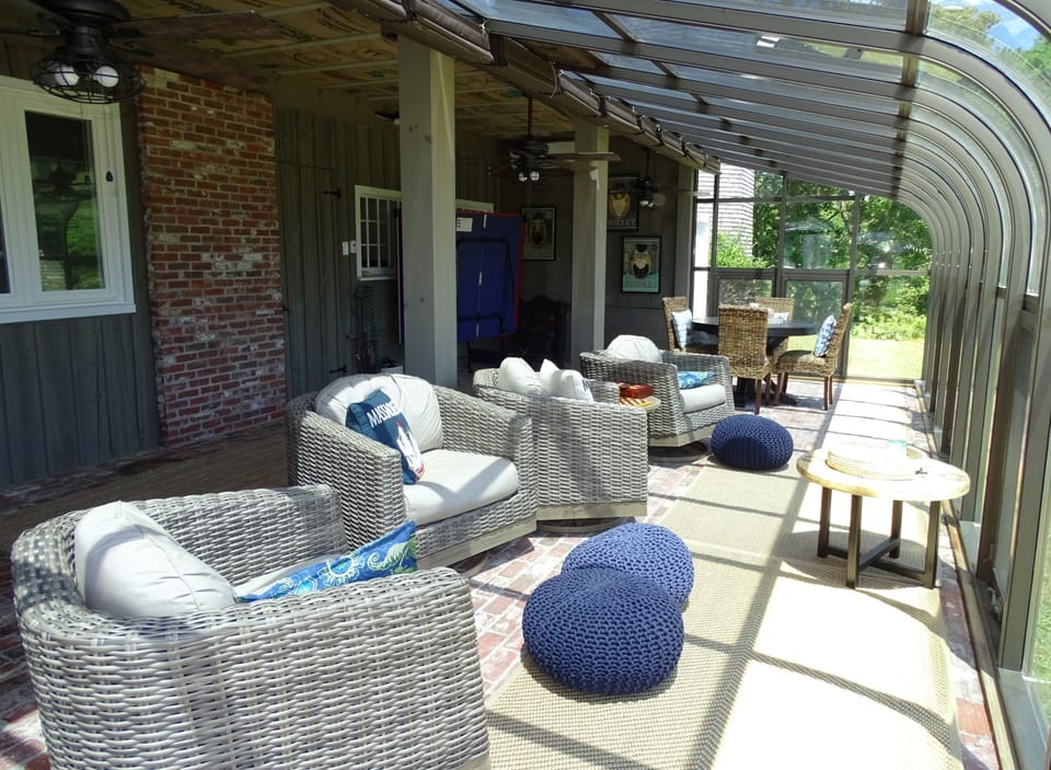 Solarium seating area.  Perfect location for morning coffee or evening cocktails