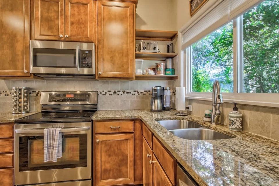 FULLY STOCKED KITCHEN! From a spice rack and baking sheets to a pizza cutter and coffee pot!