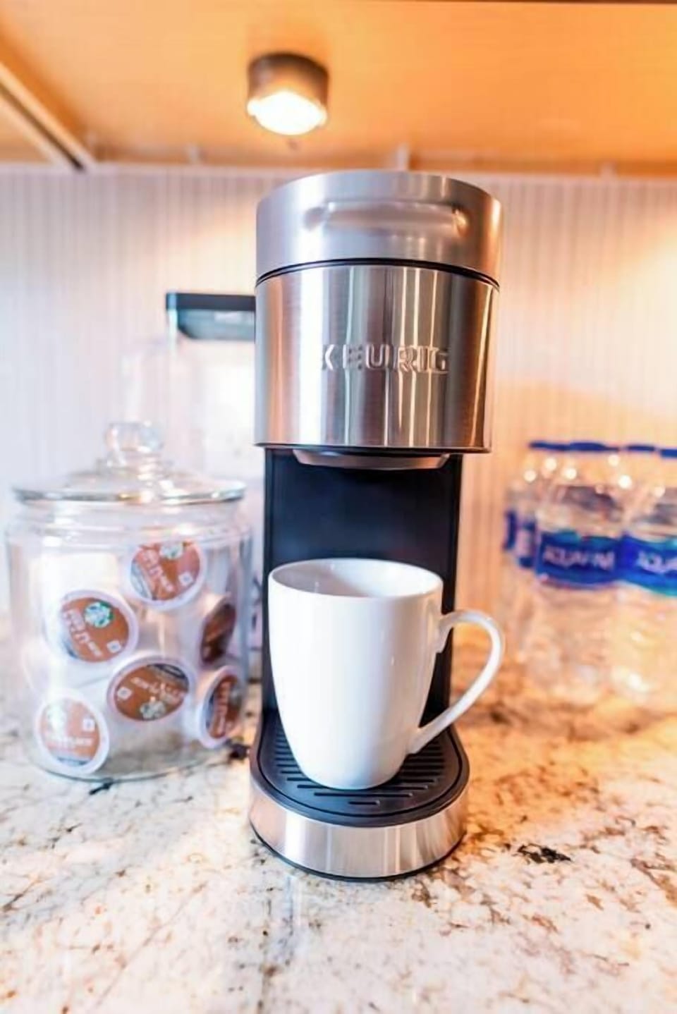 Complimentary Starter Kit of Keurig Starbucks K-Cups & Bottled Water (brand to vary)