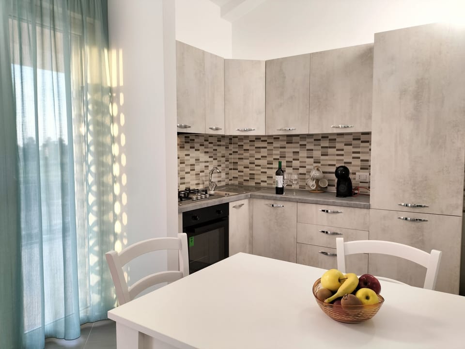Apartment | Private kitchen | Full-size fridge, microwave, oven, stovetop