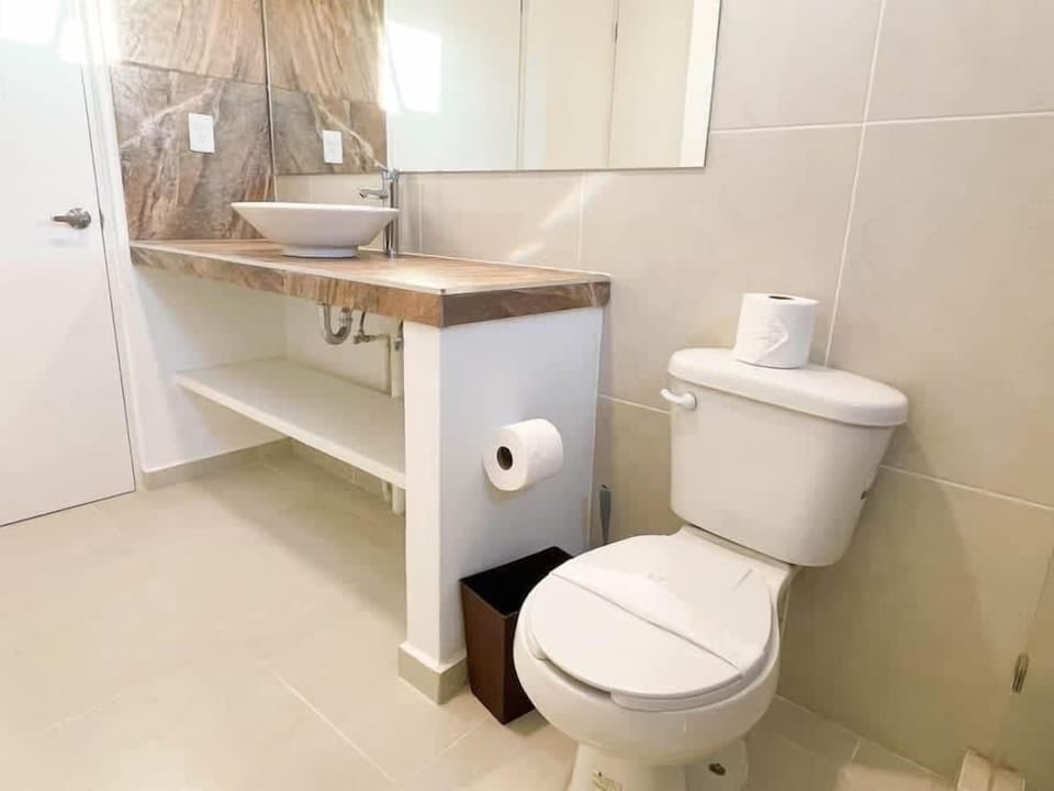 En-suite bathroom with vanity