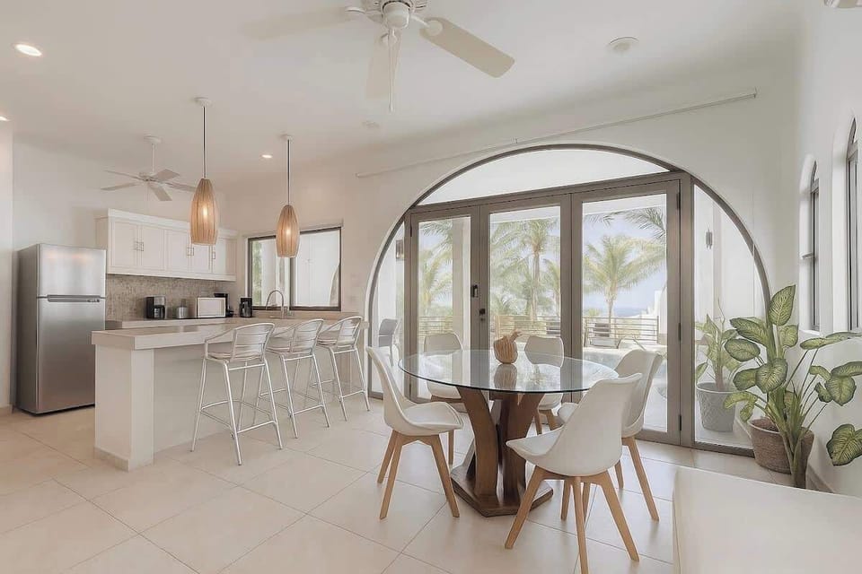 Light-filled interior with floor-to-ceiling glass