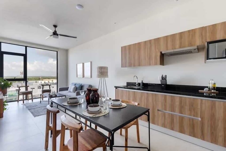 Dining room and kitchen. Living room.