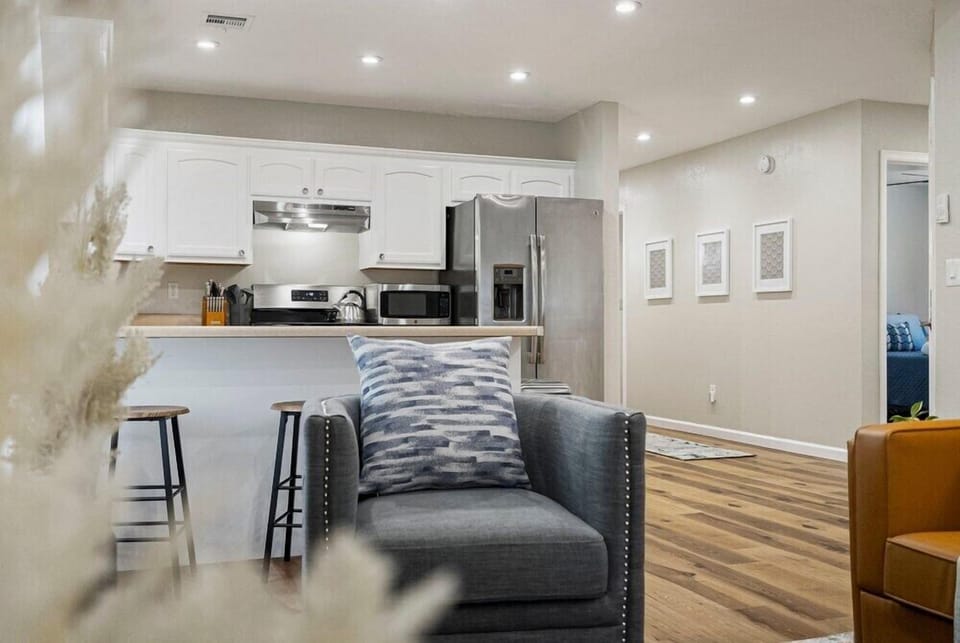 Experience the ultimate in modern living with our open-concept kitchen and living room, perfect for relaxing and entertaining in style