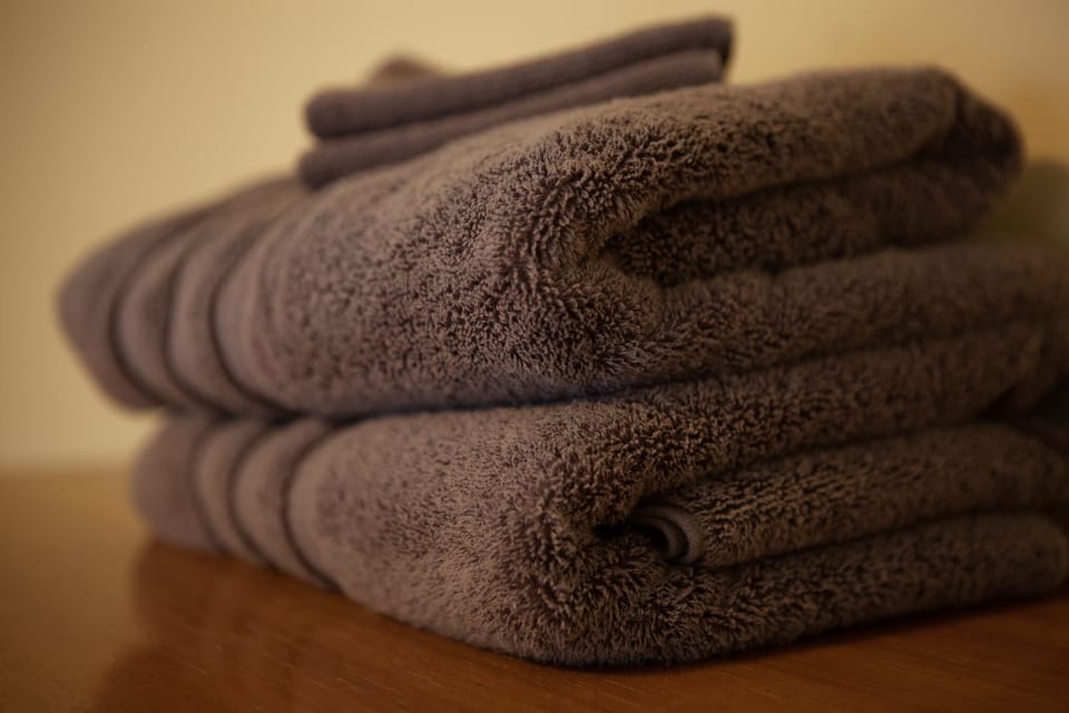 Each bedroom has two bath towels and two wash clothes