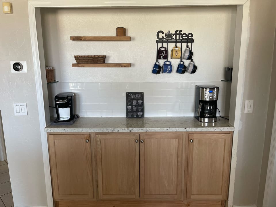 Coffee Bar with coffee maker, a Keurig and a Ninja espresso machine.